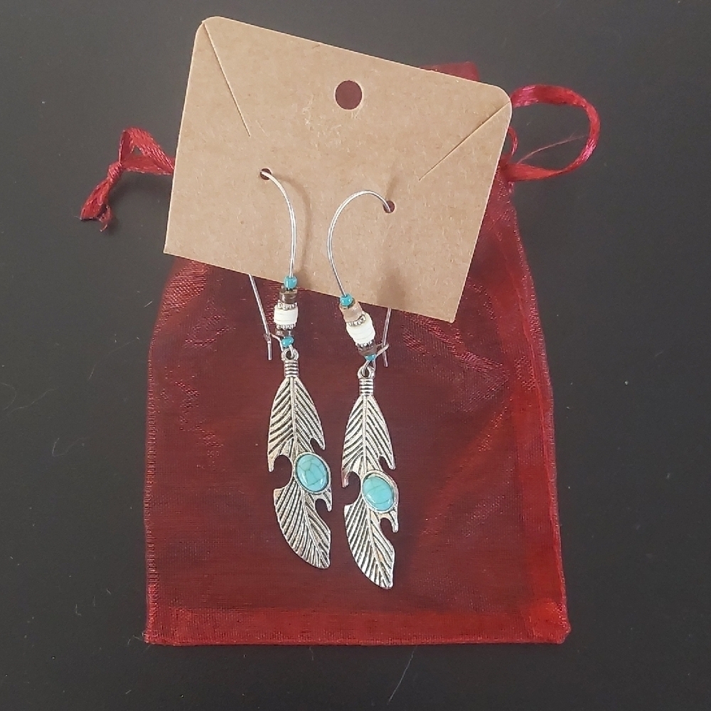 Silver and Blue Teardrop Earrings with Textured Design